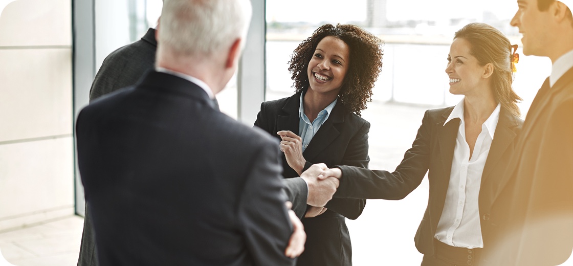 Business owners meeting with a support team
